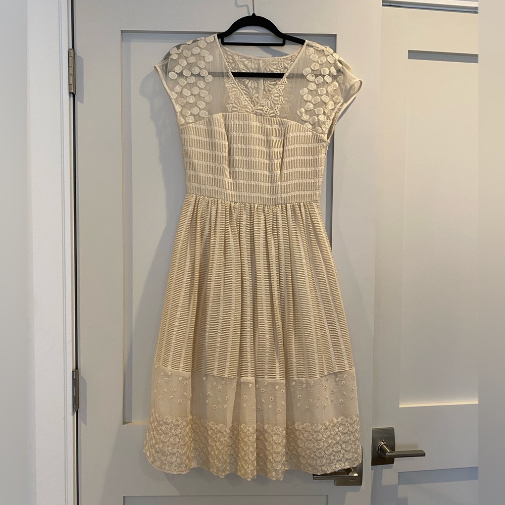 New with tags! Beautiful ivory dress